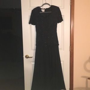 Black gown with sequin top. Worn once, looks new